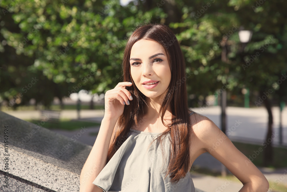 Beautiful young woman outdoors on sunny day Beautiful young woman outdoors on sunny day