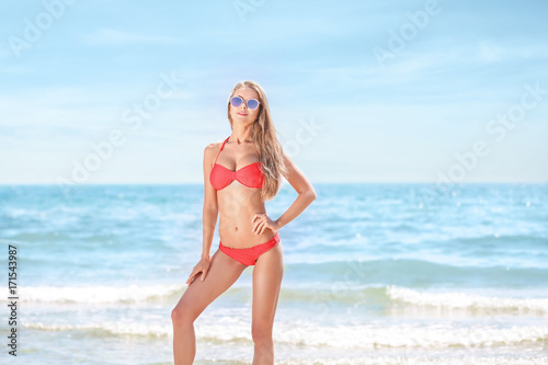 Beautiful young woman on se...