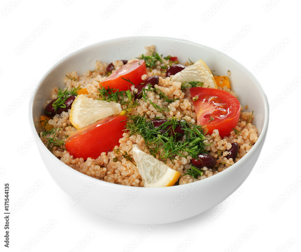 Salad with quinoa, tomato and lemon in ceramic bowl, isolated on white Salad with quinoa, tomato and lemon in ceramic bowl, isolated on white