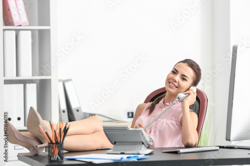 Young female receptionist t...