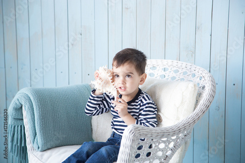 Fotografia boy playing cockleshell