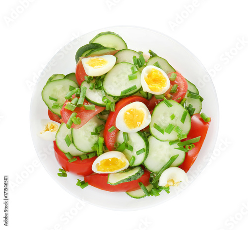 Healthy salad with cucumbers and eggs in bowl, isolated on white