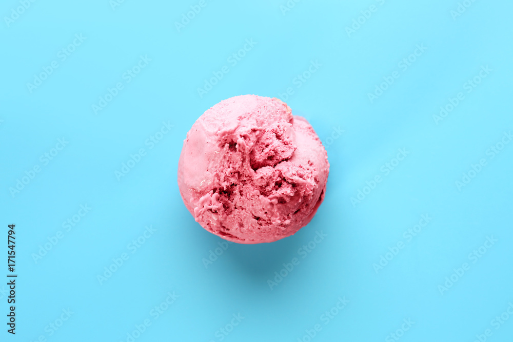 Tasty strawberry ice-cream on color background