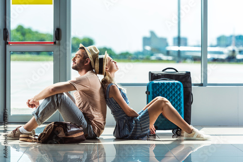 couple waiting for boarding in airport