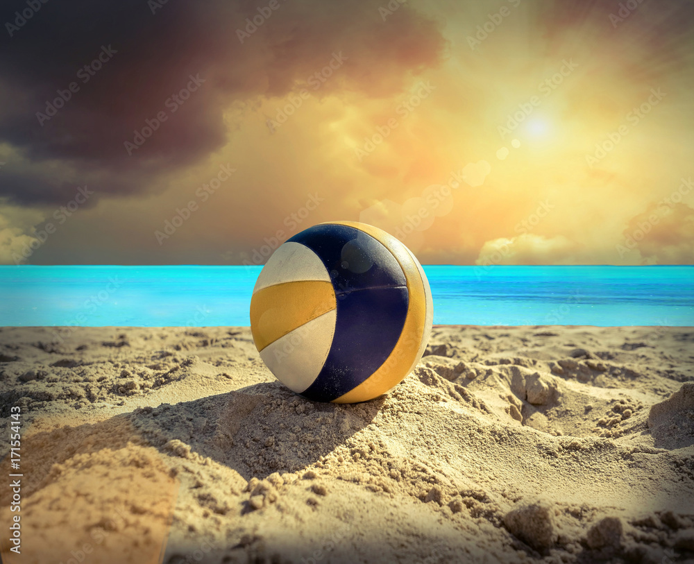 Beach Volleyball. Game ball under sunlight and blue sky.