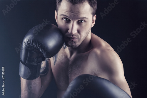  Man in boxing gloves © Artem Furman