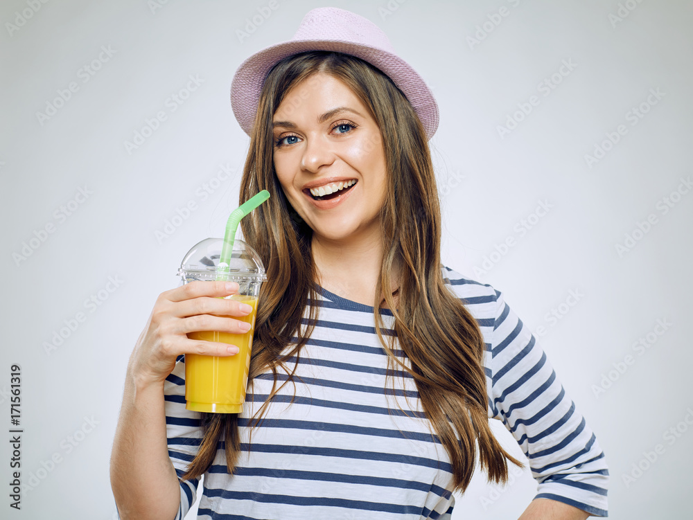 Portrait of smiling woman drinking orange juice. Portrait of smiling woman drinking orange juice.