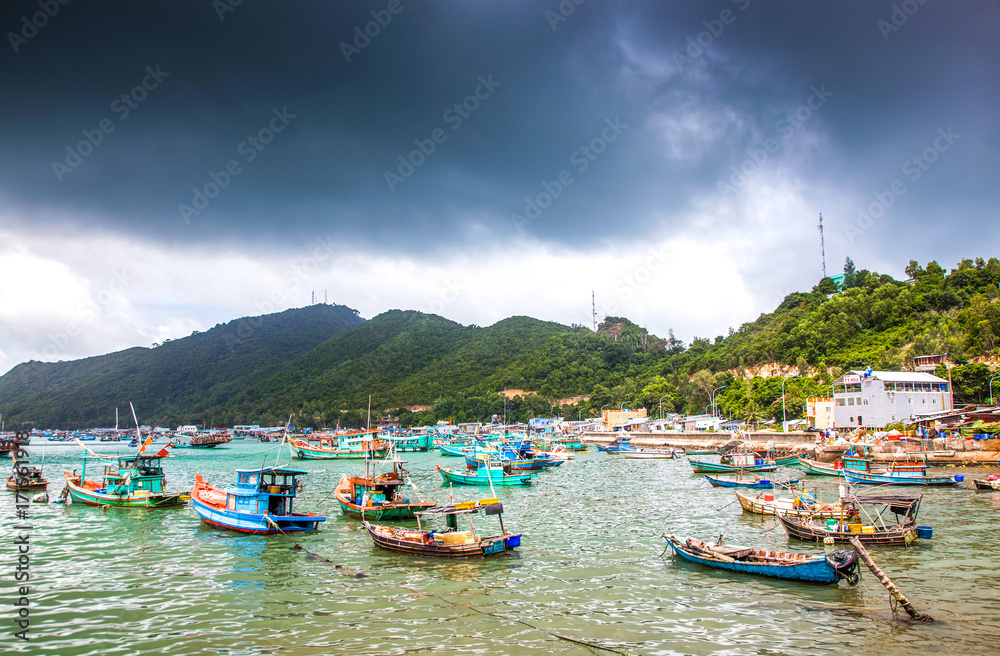 NAM DU, VIETNAM - JULY 27, 2017: Boats in Hon Tre pier, early morning, Nam Du Islands, Kien Giang, Vietnam