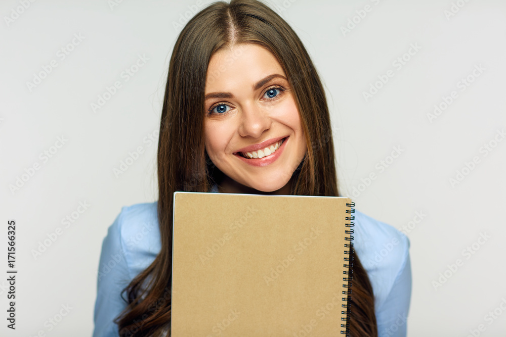 Student girl holding sign board against face. Student girl holding sign board against face.