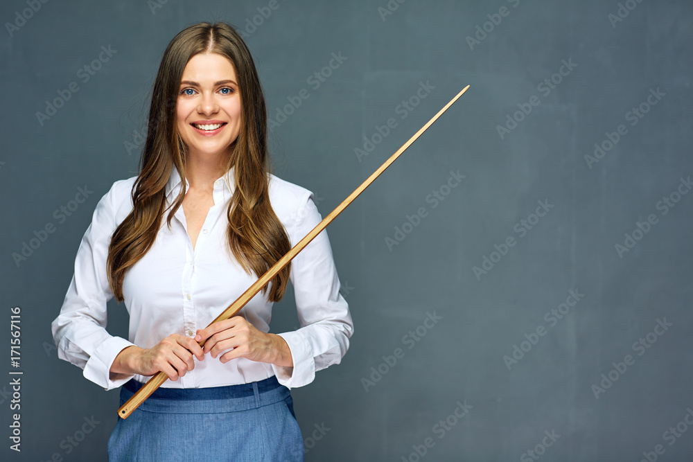 Portrait of young teacher holding wooden pointer. Portrait of young teacher holding wooden pointer.