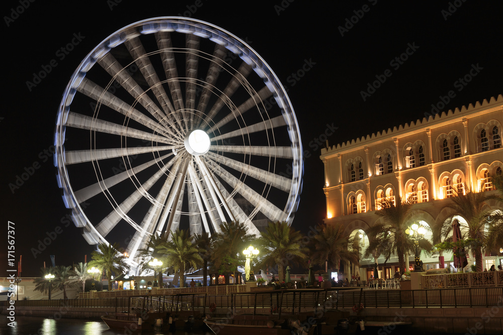 Eye of the Emirates - ferris wheel in Al Qasba in Shajah, UAE Eye of the Emirates - ferris wheel in Al Qasba in Shajah, UAE