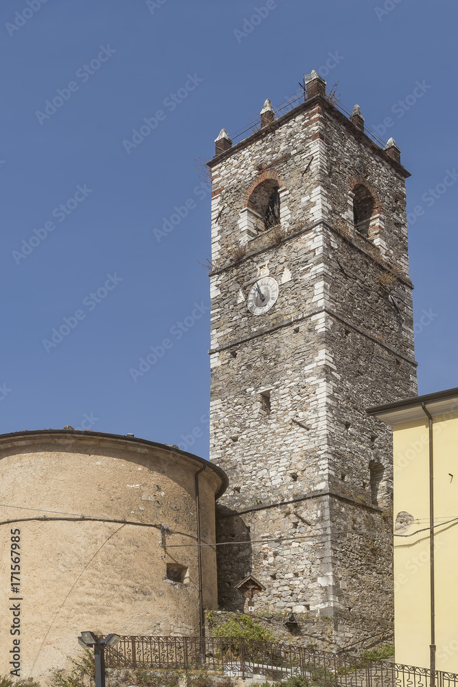 View of the bell tower of the church of San Bartolomeo in the ancient village of Colonnata, Massa Carrara, Tuscany, Italy