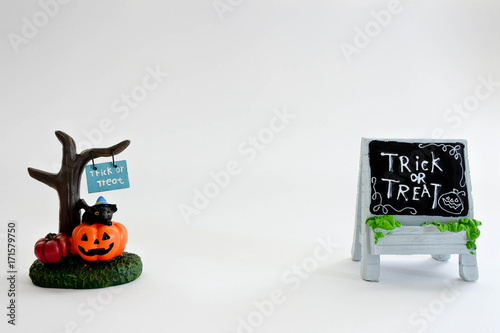 Little blackboard with the word, thick or treat on white background. Lovely props for haloween festival.