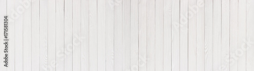 Plaques painted in white, wooden table or wall as background