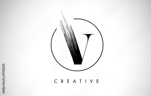 V Brush Stroke Letter Logo Design. Black Paint Logo Leters Icon. photo