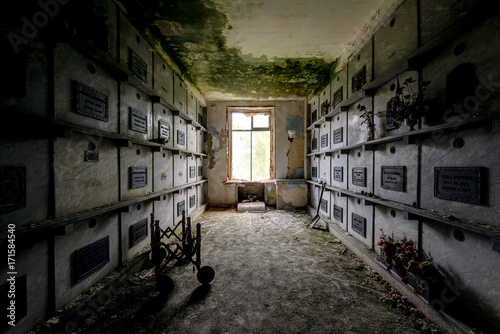 Canvas Print Dark Hallway Leading to Crypts & Coffins - Abandoned Mausoleum