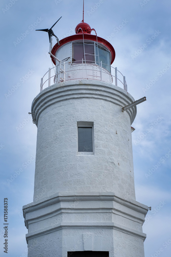 White lighthouse on the shore of the Japanese Sea, Vladivostok