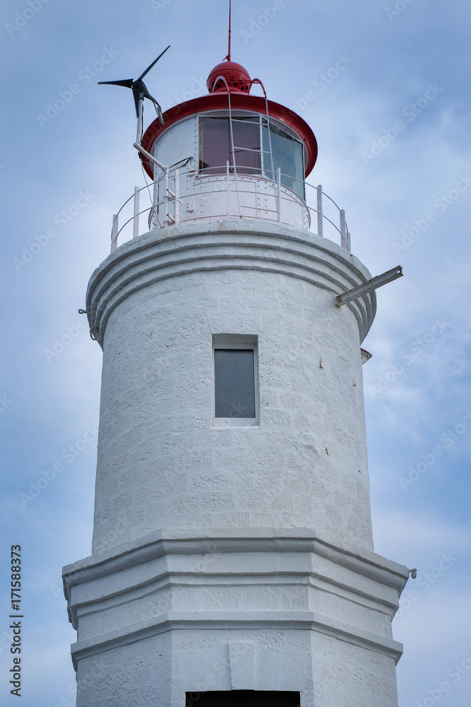 White lighthouse on the shore of the Japanese Sea, Vladivostok White lighthouse on the shore of the Japanese Sea, Vladivostok