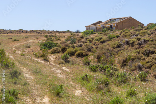 Trail and abandoned house in Arrifana