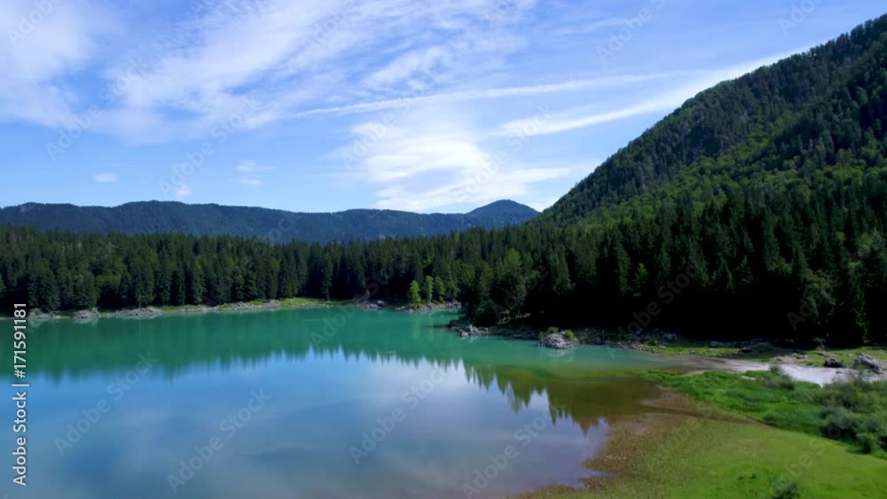 Lake Lago di Fusine Superiore Italy Alps. Aerial FPV drone flights. Lake Lago di Fusine Superiore Italy Alps. Aerial FPV drone flights.