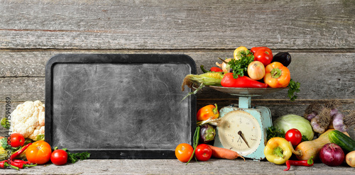 Canvas Print Banner composition of raw organic fresh vegetables, chalk board for text, balanc