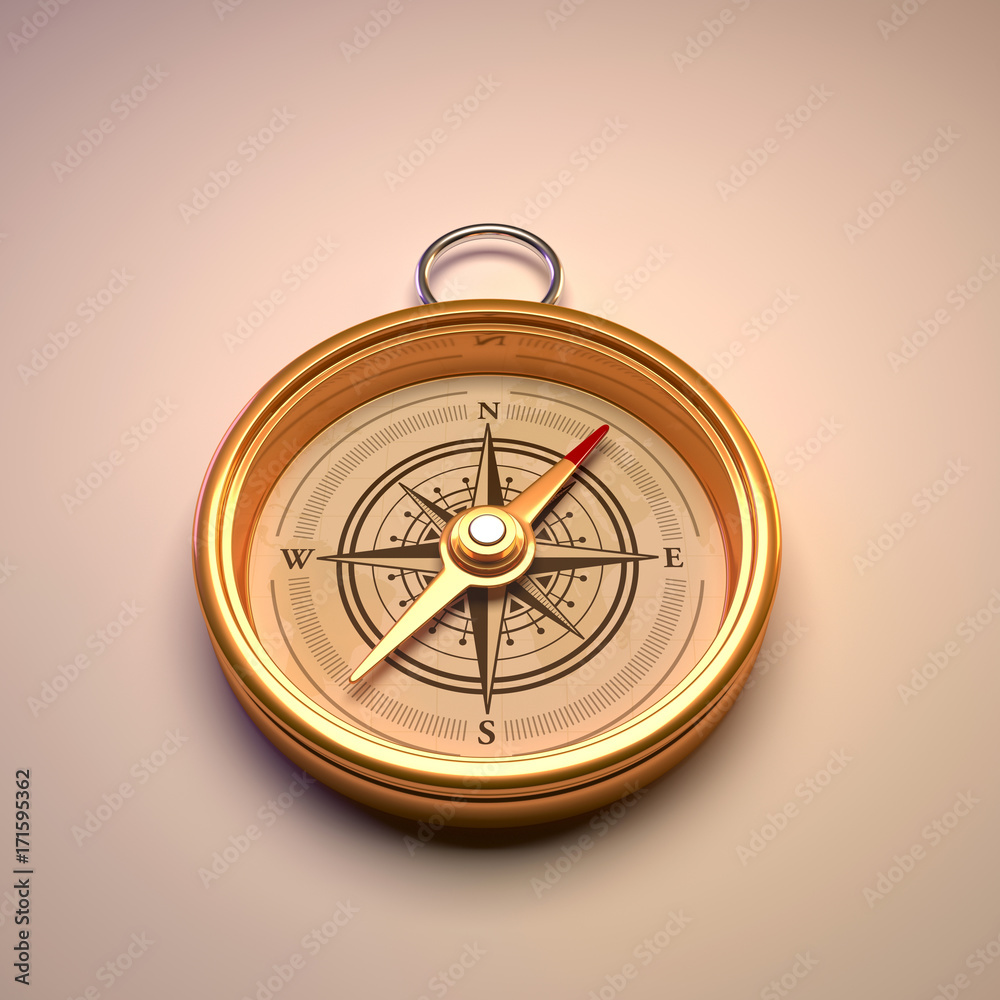 Antique gold compass isolated on background.