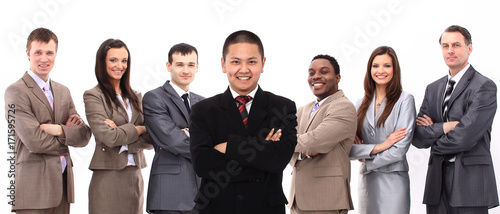 businessman standing in front of his business team
