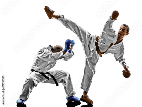 two karate men sensei and teenager student fighters fighting protections isolated on white background