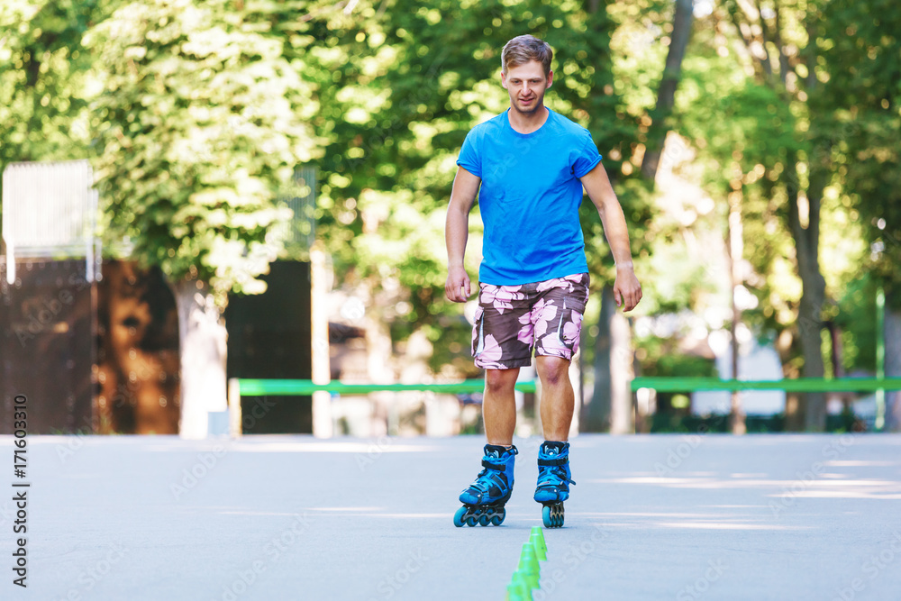 Inline roller skater on a slalom course Inline roller skater on a slalom course