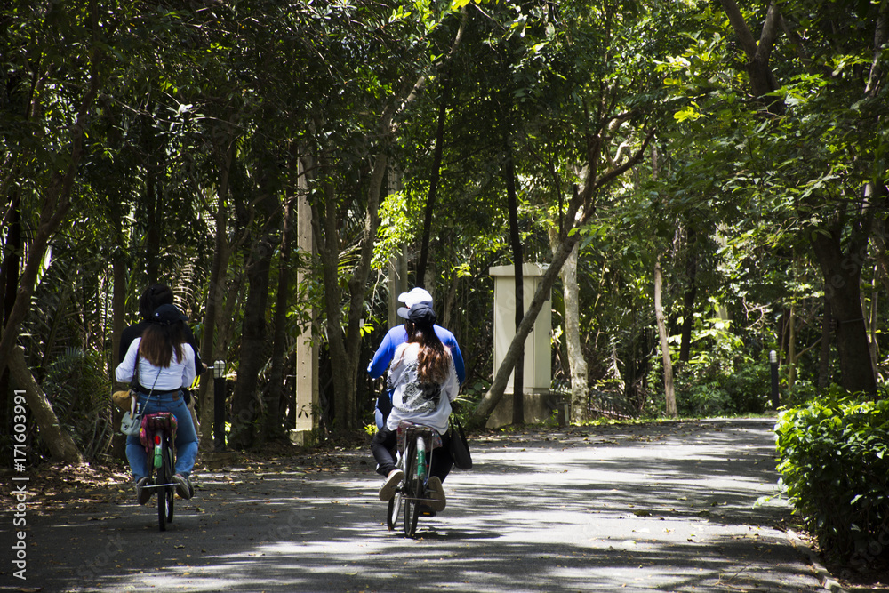 Travelers people walking and biking bicycle in Sri Nakhon Khuean Khan Park and Botanical Garden or khung bang kachao park