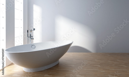 White bathtub in minimalist bathroom