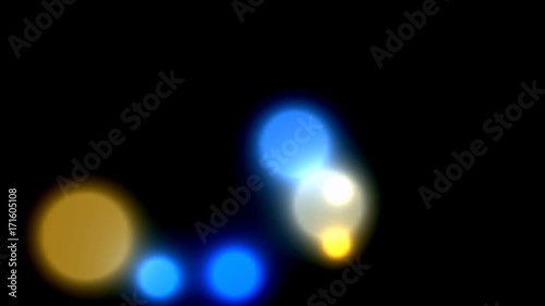 Black background. Multi-colored circles chaotically move
