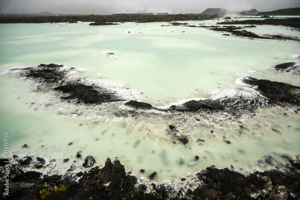 Blue lagoon in Iceland, colorful hot springs, tourist attraction.