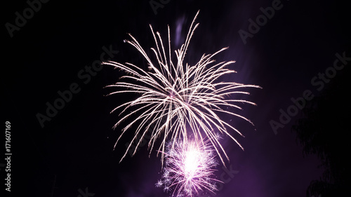 Celebration fireworks over night sky copy space. Celebration colorful fireworks. Beautiful fireworks. Holidays salute.  Independence Day. New Year. White firework. Amazing fireworks, fireworks 2017