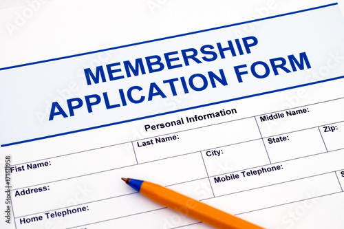 Membership application form with pen.