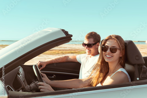 Young couple traveling by car © fotofabrika