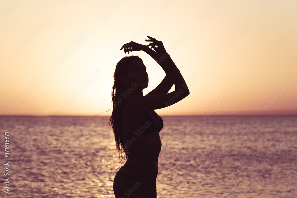 Fototapeta premium Woman is alone at beach