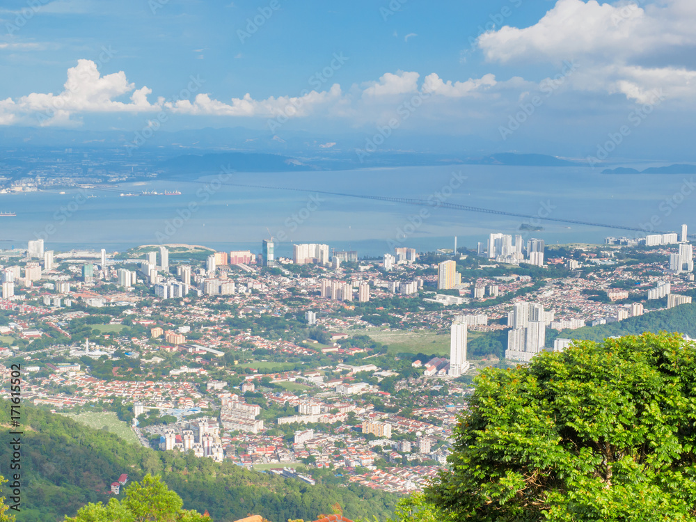The scenery from Penang Hill, Penang, Malaysia, showing the city in the foreground and the sea and Penang bridge in the background.