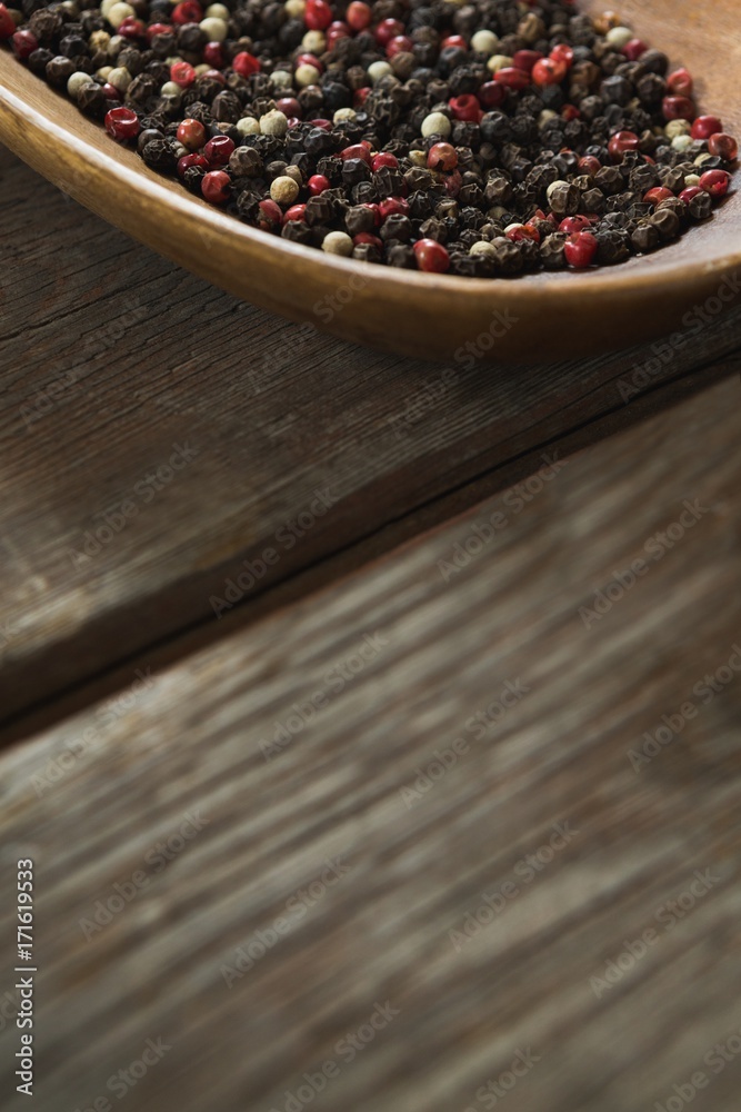 Mix peppercorns in wooden bowl Mix peppercorns in wooden bowl