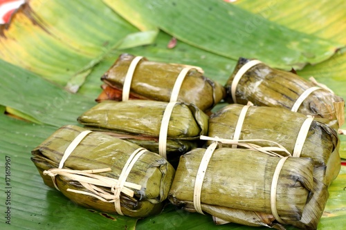 Sticky rice wrapped in banana leaves