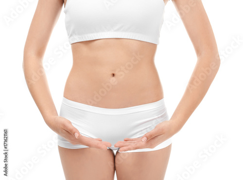 Young woman in underwear on white background. Diet concept