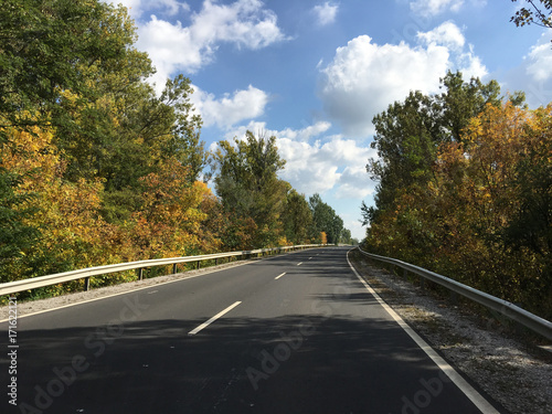 Driving during autumn towards Poroszlo