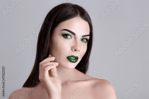 Young beautiful woman with ...
