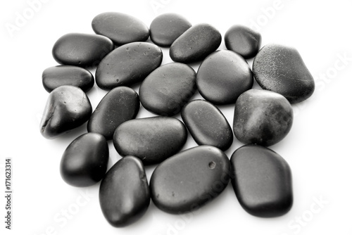 Massage stones on white. Black Stones isolated