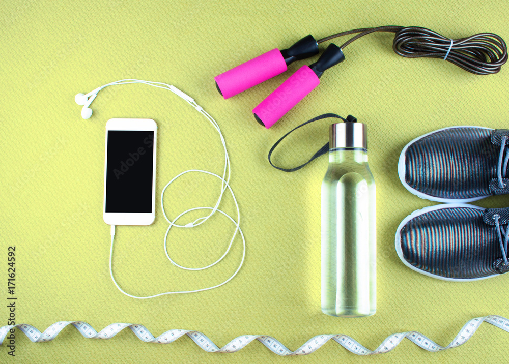 Flat lay shot of sneakers, earphones, phone. Flat lay shot of sneakers, earphones, phone.