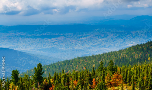 Colourful autumn forest on top of a mountain ridge