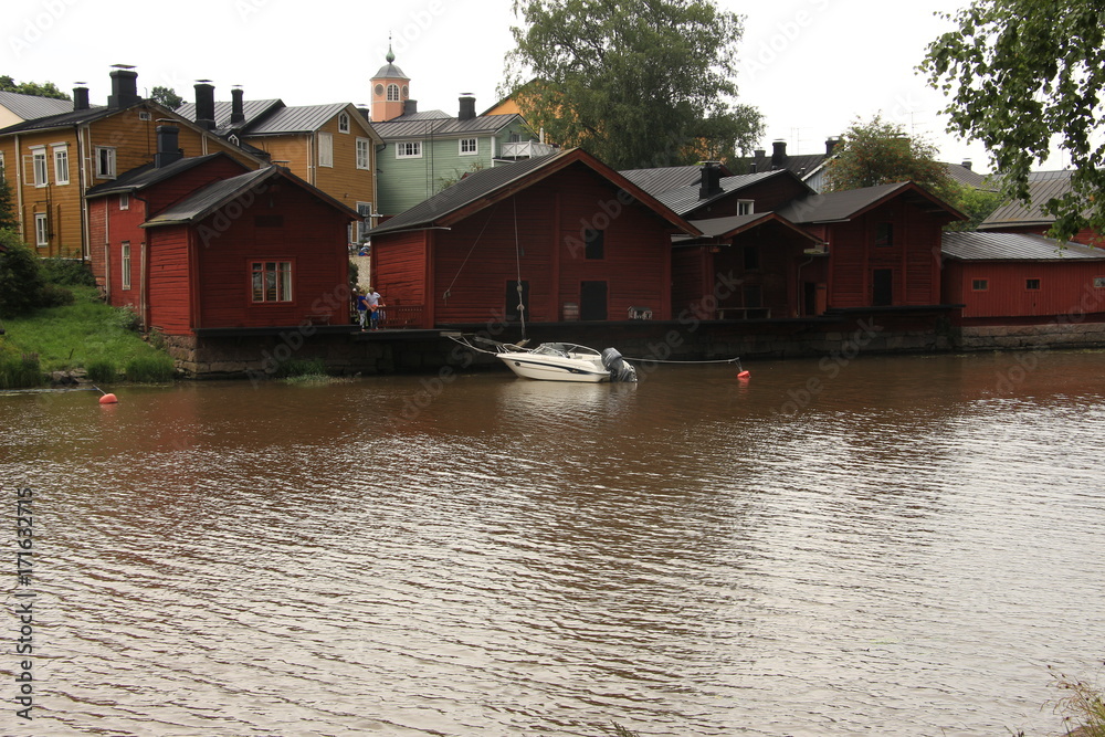 Fototapeta premium village on the river bank