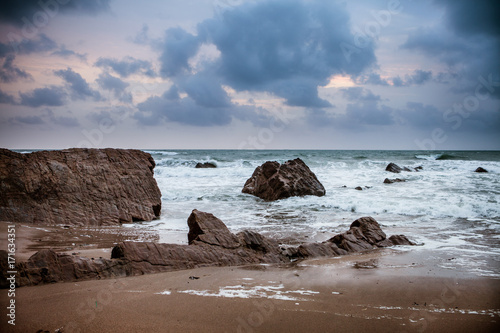 Картината върху платно Sunset over Rocks at Widemouth Bay, Cornwall