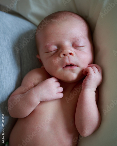Overhead view of a sleeping baby boy