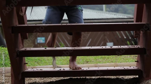 Kids running up stairs photo